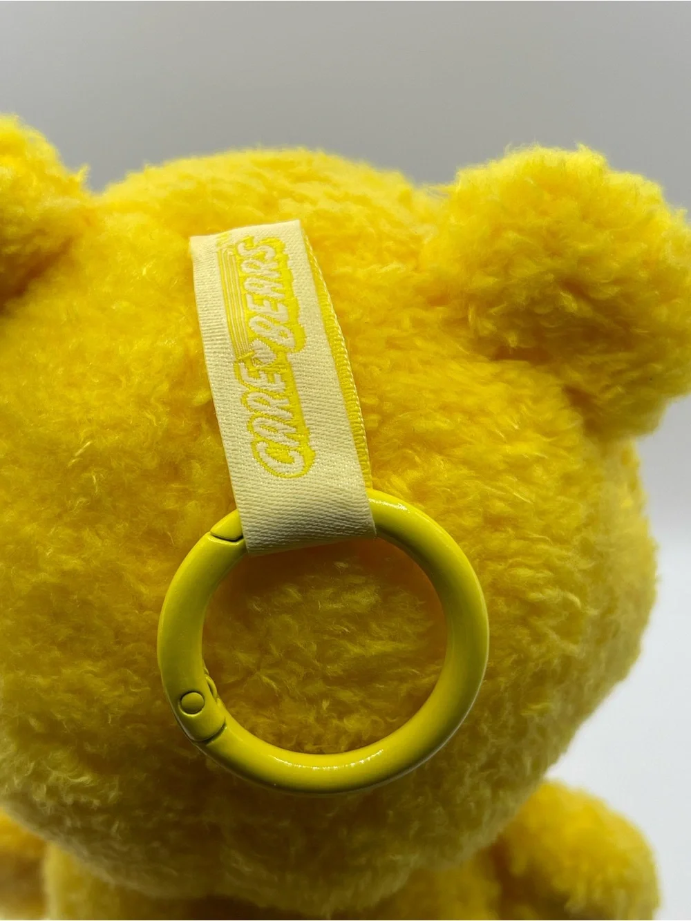 Care Bears Surprise Reveal Caring Cuties Plush- Yellow Funshine Bear
